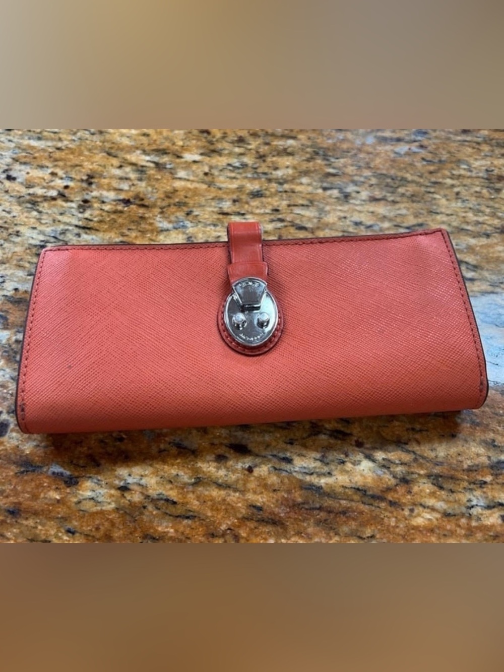 Tumi Orange and brown leather wallet